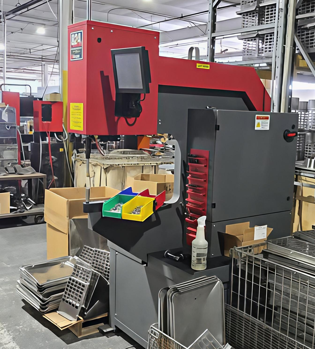 Industrial machine with color-coded storage bins